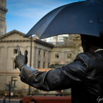 portland photos - portland pictures - portland images - statue - pioneer courthouse square - man with umbrella