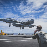 navy photos - photo of fighter jet - aircraft carrier - f/a 18 super hornet - landing signal officer - pilot - plane - jet - landing